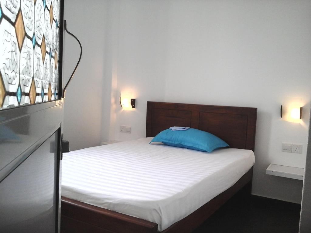 Petit Guest House Негомбо Стая снимка