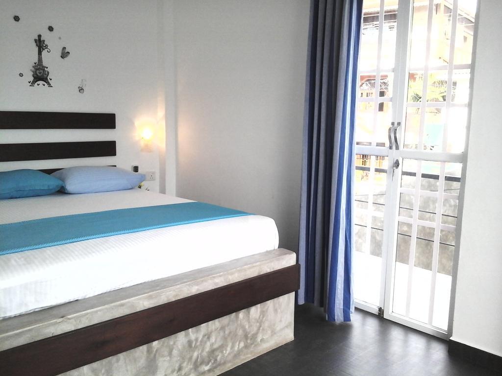 Petit Guest House Негомбо Стая снимка