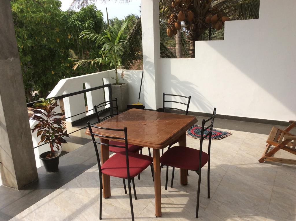 Petit Guest House Негомбо Стая снимка