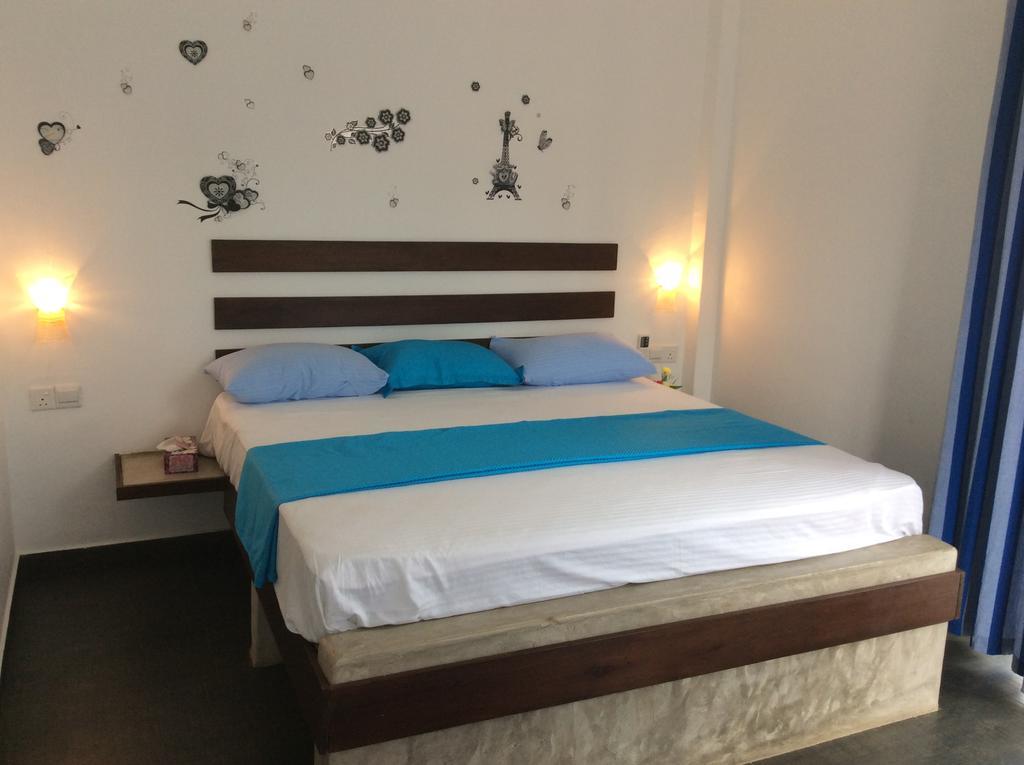 Petit Guest House Негомбо Стая снимка
